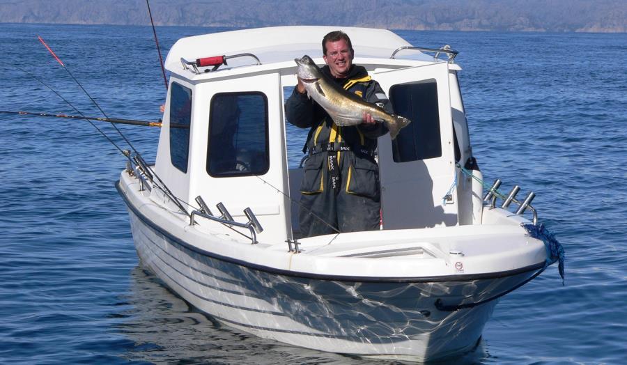 Boot mit Ronny im Einsatz auf dem Listafjorden