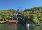 Sicht vom Fjord auf das Ferienhaus Camilla - Rosfjord